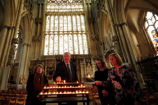 Friends of Claudia Lawrence light candles to mark the 10th anniversary of her going missing at York Minster. Pictured from the left to right are Hazel Dales, Martin Dales, Jen King and Suzy Cooper. Picture by Simon Hulme.