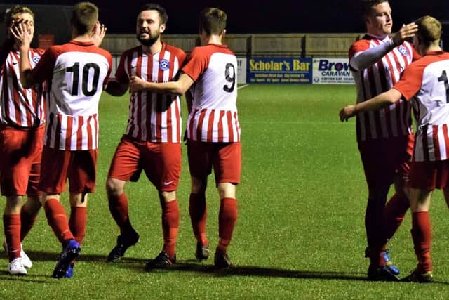 Hunmanby United celebrate their second goal in the 2-1 win against Seamer
Pictures by Simon Dobson