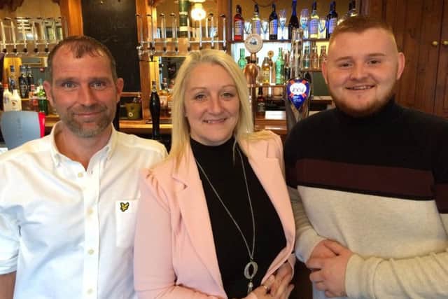 Laura Wilcock and Anthony Procter with Laura's son Bradley.