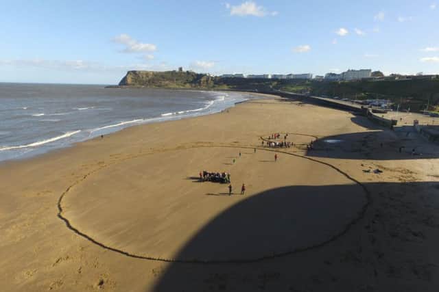 School children built more than 800 sandcastles as part of an event to celebrate Pi Day.