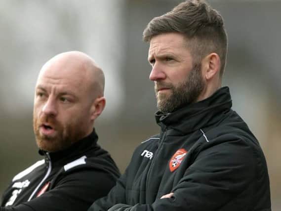 Steve Roberts on the touchline with Tom Morgan