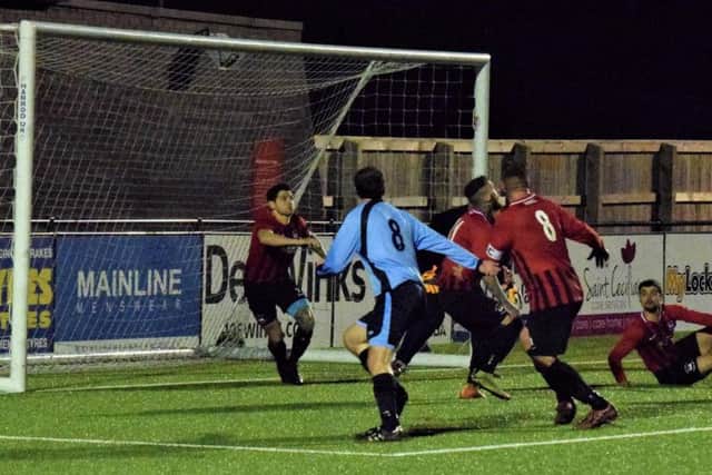Filey attack the West Pier goal in their League Cup semi-final before it was abandoned after 74 minutes due to crowd trouble. Picture: Simon Dobson.