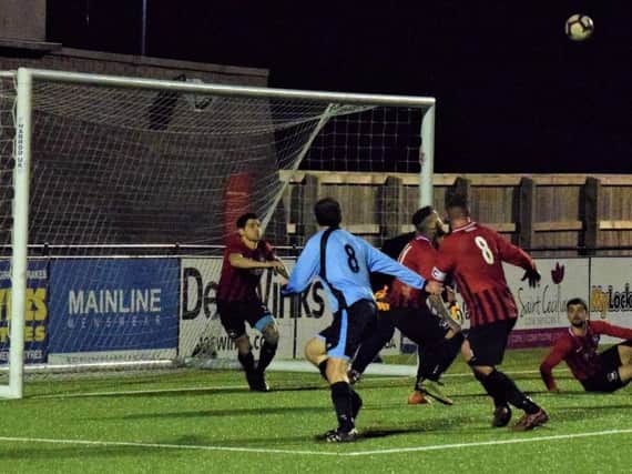 Filey attack the West Pier goal in their League Cup semi-final before it was abandoned after 74 minutes due to crowd trouble. Picture: Simon Dobson.