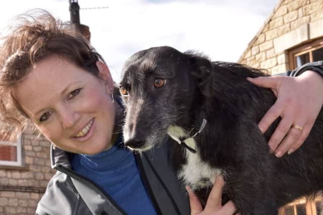 Emma Lund is pictured with her own dog Gypsy.