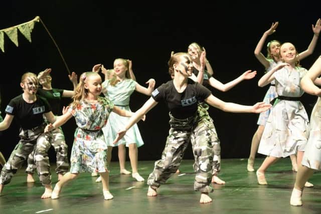 Malton School students perform their War and Peace routine during the Rock Challenge event at the Barbican.