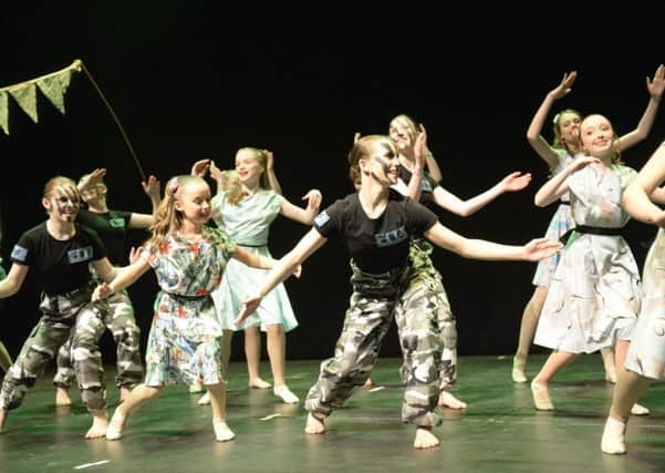 Malton School students perform their War and Peace routine during the Rock Challenge event at the Barbican.