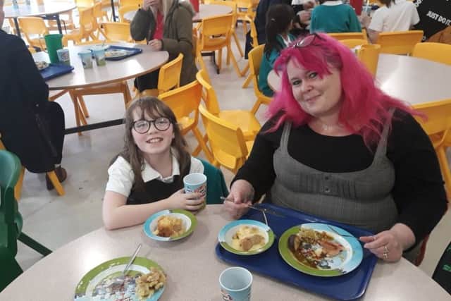 Parents lunch with their children.