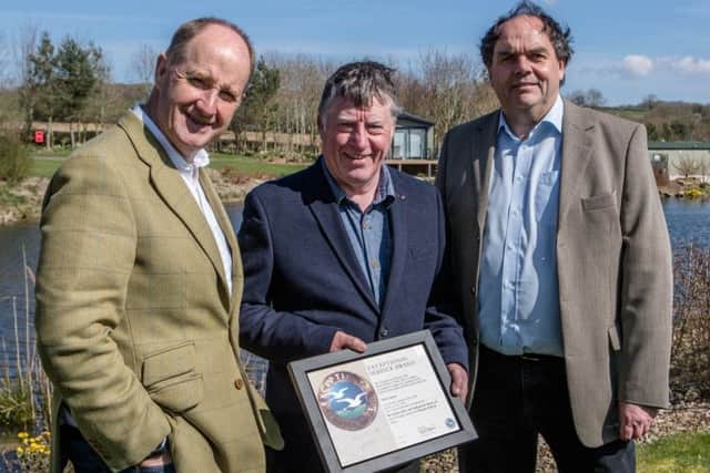 Trevor Jones with his certificate.