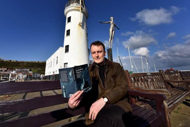 Conservationist Tom Nancollas outside Scarborough Lighthouse