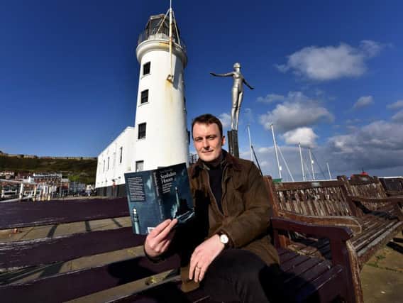 Conservationist Tom Nancollas outside Scarborough Lighthouse