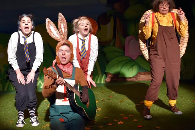 Max Runham is Hare, Ceridwen Smith is Tortoise, Georgia Mason is Squirrel (red dungarees) and Ruby Hilton is Badger (blue dungarees).