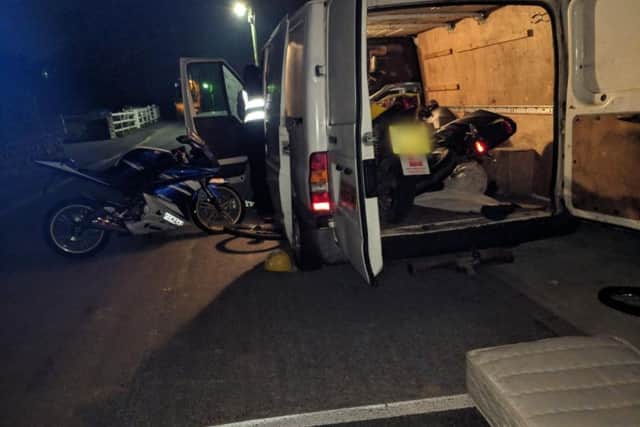 The pair were loading items into this van before being disturbed