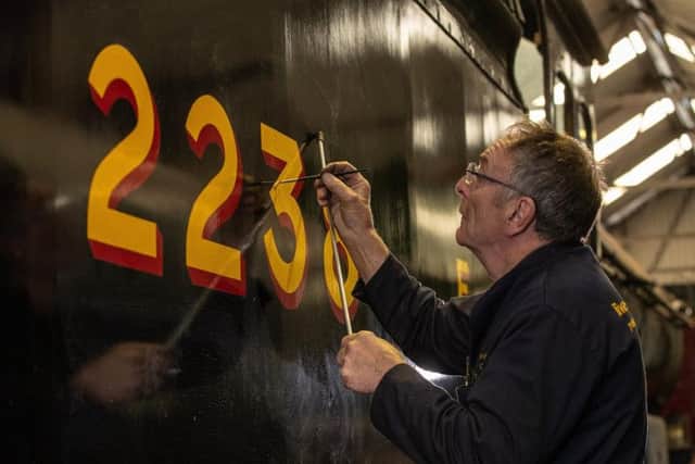 Peter Whittaker makes sures the locomotives look their best