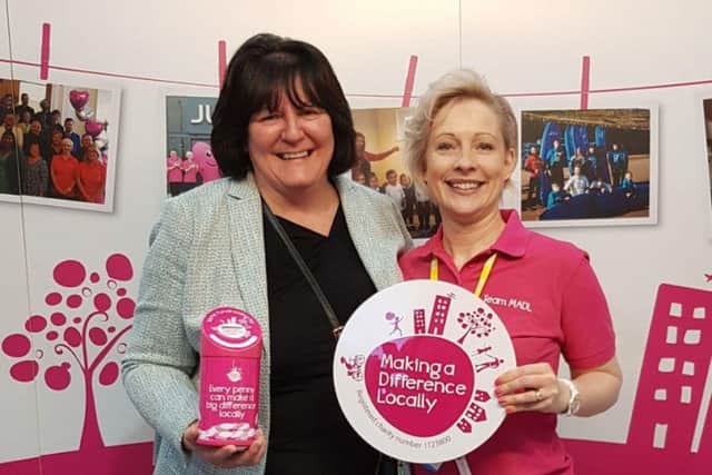 Director Valerie Aston, left, was rewarded for her tireless dedication to supporting local causes.