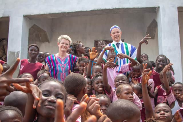 Kate and Mark Parker-Randall meet children at Hope School in Kenema.