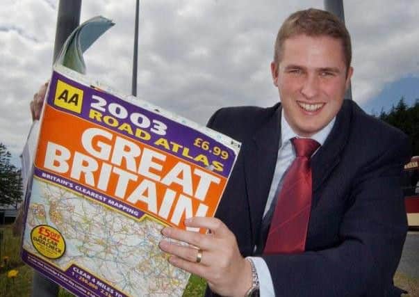 Pictured while a county councillor,  Gavin Williamson was trying to get the AA to put the local area of Crossgates on its maps.