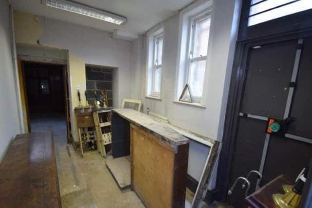 Built over three storeys, the property retains many stunning features including the oak panelled walls and a highly ornate ceiling in the former bank area.