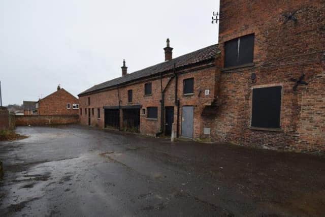To the rear there is a walled courtyard with coach house, stables and ample parking.