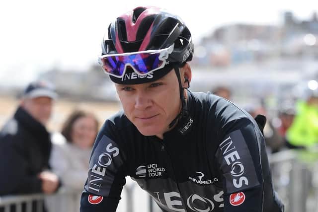 Chris Froome heads to the start line.