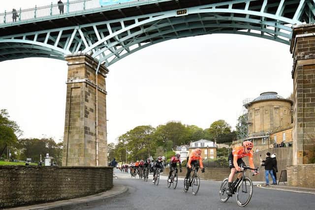The riders sweep on to Scarborough's South Bay, beneath the Spa Bridge