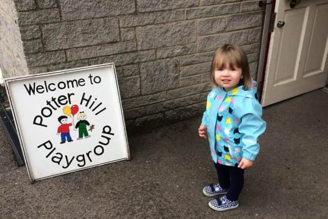 Potter Hill Playgroup with one of its youngsters.
