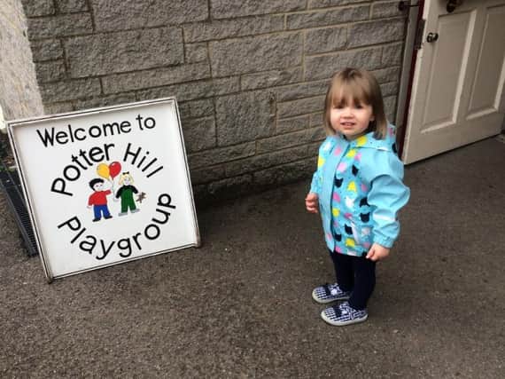 Potter Hill Playgroup with one of its youngsters.