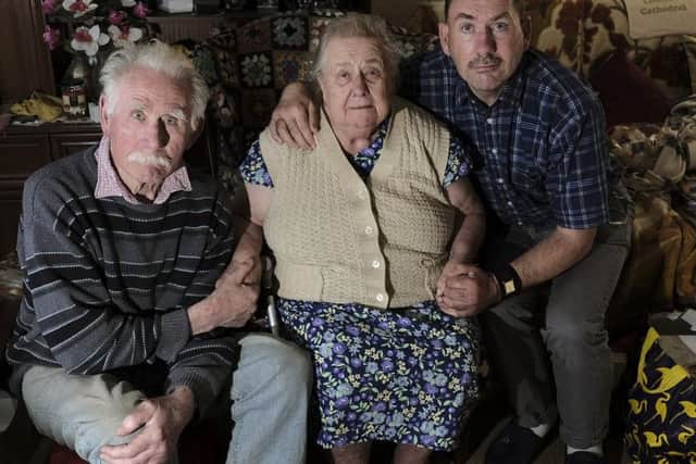 From left to right: Brian, June and Neil Woods.