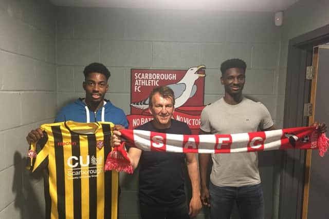 Boss John Deacey with T'Nique Fishley, left, and Isaac Assenso