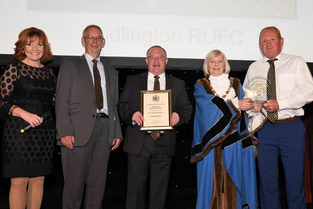 Representatives from Bridlington Rugby Club with Margaret Chadwick and event host Clare Frisby.