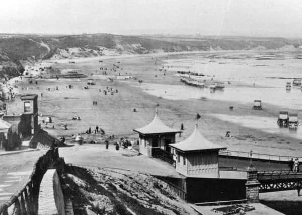 A view of Scarborough's North Bay before the construction of Royal Albert Drive in the late 1880s and opened in 1890..
The carriage road eventually linked up Peasholm Gap with the area in the foreground of the picture which shows the entrance to North Bay Pier at the bottom of Albert Road commonly known as 'Chain Hill'.
Photo reproduced courtesy of the Max Payne collection. 
Reprints can be ordered with proceeds going to local charities. Telephone 0330 1230203 and quote reference number