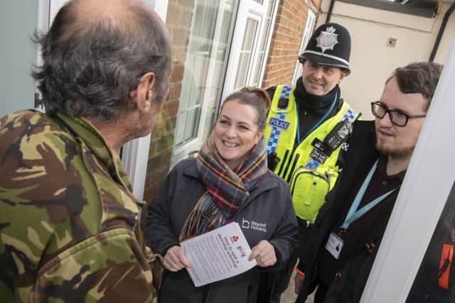 PC Ian Sim, of Eastfield Neighbourhood Policing Team, with volunteers during last years Operation Cracker.