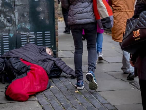 The leader of Scarborough Council has called on North Yorkshire County Council to reverse its decision to cut the authoritys homeless support budget.
