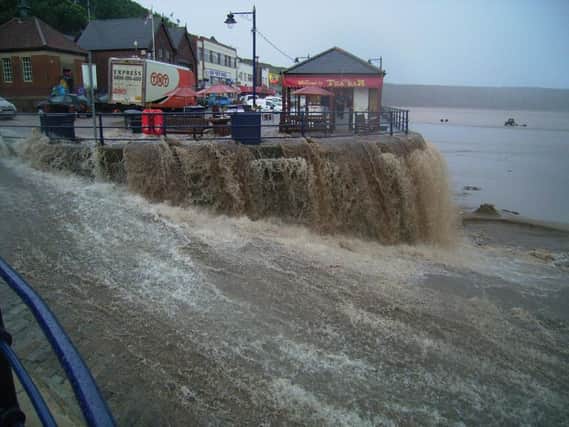 Filey floods in 2002. Picture by Mike Cockerill.
