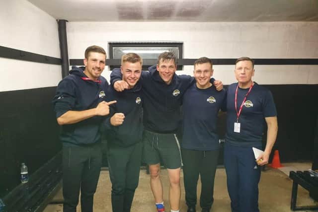 From left, Chance Wedge, Kieran Glave, Sam Mayers, Constantin Costache and coach George Rhodes Sr