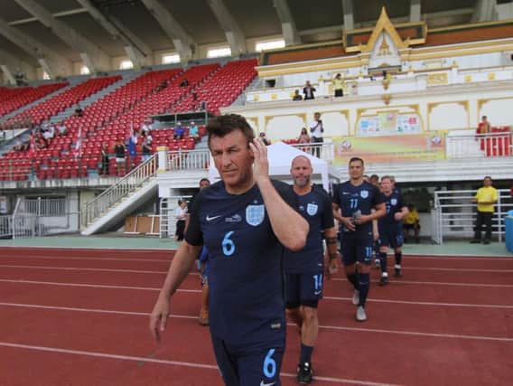 Boro boss John Deacey walks out with the England team for their Seniors World Cup final against Iran