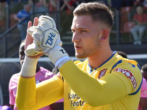 Boro keeper Tommy Taylor is 100% focussed on performing well for the club despite links to Football League sides
