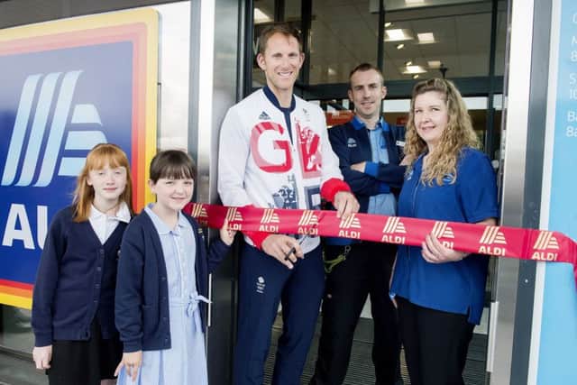 Opening of Aldi Store in Whitby by Olympic Rowing Champion Matthew Langridge.
Pictured cutting the ribbon with Emily Dugdale (left) and Madeline Anscombe from East Whitby Primary Academy, Syore Manager Stuart and Assistant Store Manager Sarah Noble.
Picture: Sean Spencer.