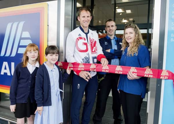 Opening of Aldi Store in Whitby by Olympic Rowing Champion Matthew Langridge.
Pictured cutting the ribbon with Emily Dugdale (left) and Madeline Anscombe from East Whitby Primary Academy, Syore Manager Stuart and Assistant Store Manager Sarah Noble.
Picture: Sean Spencer.