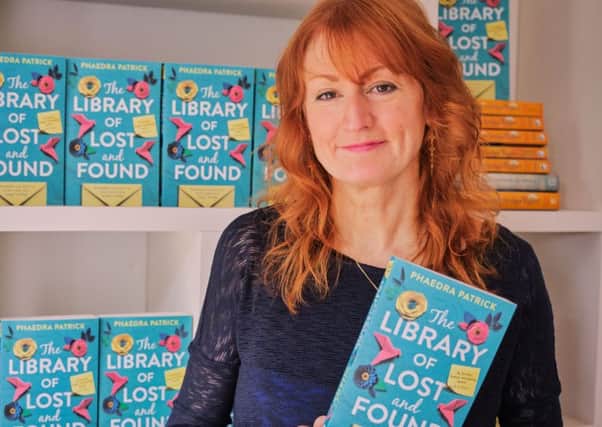 Author Phaedra Patrick with her new book The Library of Lost and Found.