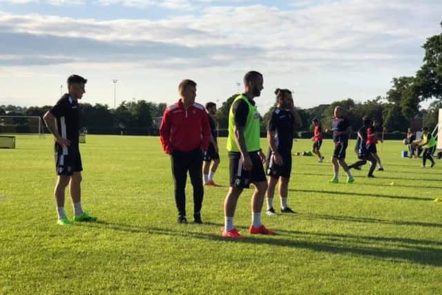 Boss John Deacey watches on as pre-season begins