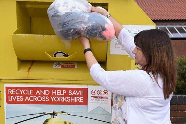 Waste and recycling officer Karen Wagg is urging residents to recycling their clothes and shoes at clothing recycling banks or charity shops.