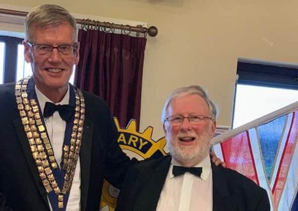 New president John Riby is pictured with outgoing president Dr Ian Holland.