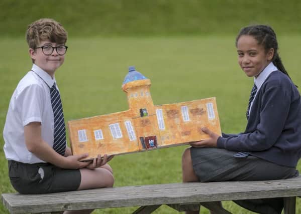 Jack Cliffe and Adeline James Year 5 pupils at St Martin's School with their model of The Rotunda Museum.
©Tony Bartholomew