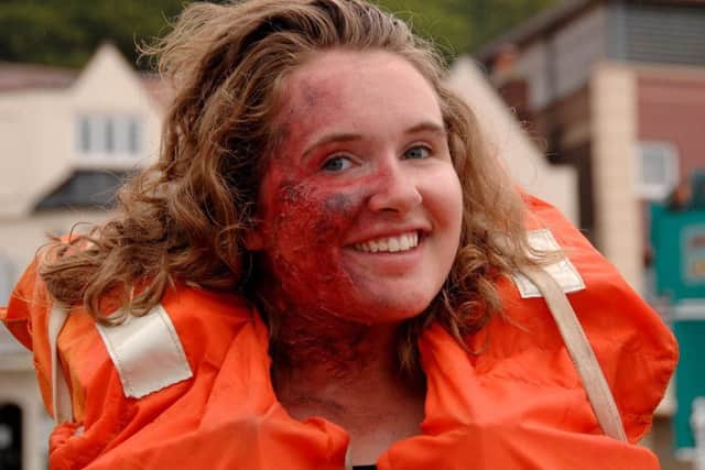 Gruesome injury make-up was applied to 'casualty' Claire Munday.
