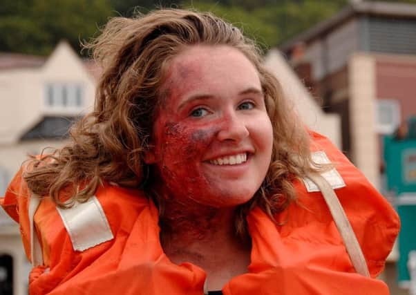 Gruesome injury make-up was applied to 'casualty' Claire Munday.