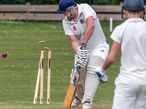 DISMISSED: Forge Valleys John Flinton is comprehensively bowled during his sides defeat at Fylingdales in Division One. PICTURES BY BRIAN MURFIELD