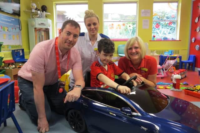 Paul Whelan, Eleanor Basnett, patient Ilhan, 10, and Tracey Cleminson.