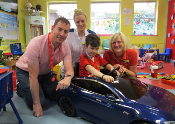 Paul Whelan, Eleanor Basnett, patient Ilhan, 10, and Tracey Cleminson.