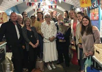 Fundraiser Jean Dixon is congratulated by Yorkshire Air Ambulance staff at Scarborough Market Hall.