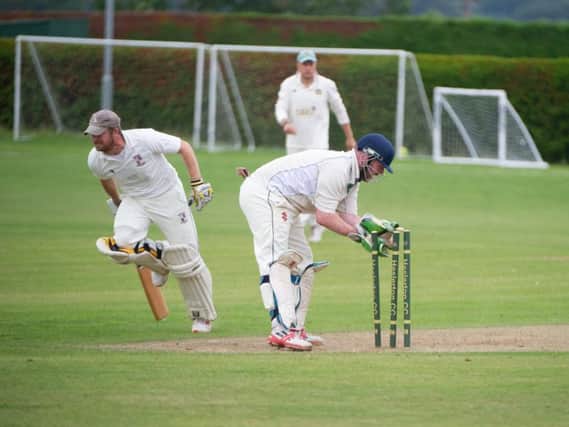 Tom Pateman manages to avoid being run out in Bromptons win against Heslerton in the Premier Division. PICTURES BY ANDY STANDING